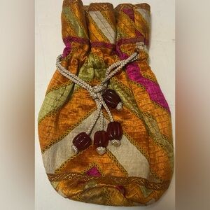 KC Malhan vintage drawstring pouch purse